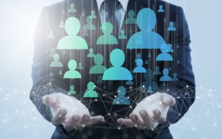 Business person holding network structure and customer icons. Business person holding network structure and customer icons.